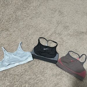 Nike Sports Bra Set - Gray, Black-Gray and Pink-Gray. one has a paint stain.